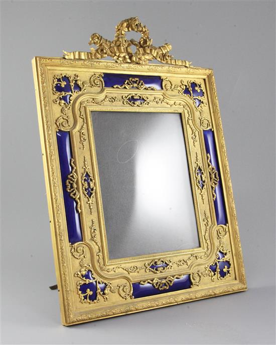 An early 20th century French blue enamel and ormolu photograph frame, height 16in.
